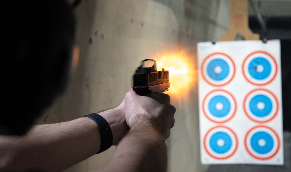 testing the Springfield XD Mod3 9x19mm Parabellum semi-automatic pistol at the shooting range