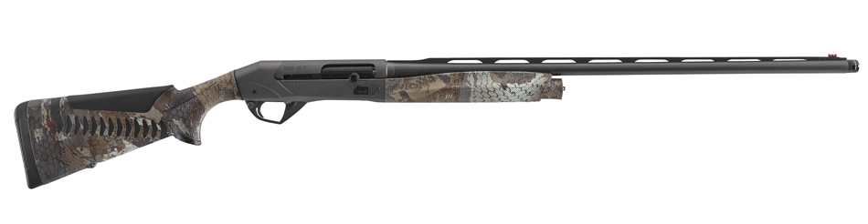 At the 2025 SHOT Show, I captured a close-up photo of the Benelli Super Black Eagle 3 A.I. in GORE™ OPTIFADE Timber camo. The image showcases the shotgun's gray anodized receiver and BE.S.T. barrel finish, highlighting its sleek, corrosion-resistant design. The 28-inch A.I. barrel with CRIO chokes is prominently displayed, emphasizing its advanced engineering for enhanced velocity and penetration. The ComforTech™ 3 stock is clearly visible, underscoring its role in reducing recoil for all-day comfort. Booth lighting accentuates the shotgun’s premium materials and craftsmanship. Informational signage in the background outlines the key features of the SBE3 A.I., drawing attention from attendees eager to learn about this innovative hunting shotgun.