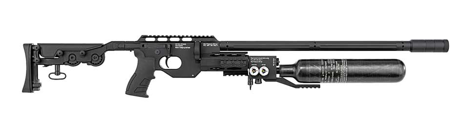 At the SHOT Show, I photographed the Hatsan TacBoss air rifle on display, highlighting its pre-charged pneumatic design and multi-shot rotary magazine system. Available in .22 and .25 calibers, this rifle featured a 12-shot capacity in .22 and a 10-shot capacity in .25. The QuietEnergy barrel was showcased, reducing noise for a quieter shooting experience. Its ergonomic synthetic stock included a raised cheek rest for added comfort, and the Picatinny/Weaver rail system demonstrated its adaptability for mounting scopes and accessories. The side-lever action was prominently displayed, allowing quick cycling between shots. This photo captures the TacBoss as a high-performance option for both target shooters and hunters.