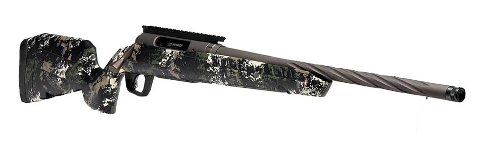 At the 2025 SHOT Show, the Savage AXIS 2 PRO in Forest SP Camo stood out at the Savage Arms booth. The camo pattern seamlessly blended with outdoor-inspired decor, highlighting its versatility for various hunting environments. The spiral fluting on the barrel was prominently showcased, emphasizing its cooling and consistency benefits. The threaded barrel, paired with a sleek ergonomic bolt handle, demonstrated the rifle's modern design. A representative demonstrated the user-adjustable AccuTrigger, allowing attendees to experience its customizable settings firsthand. The rifle's Cerakote finish added a polished touch, enhancing both durability and aesthetics.