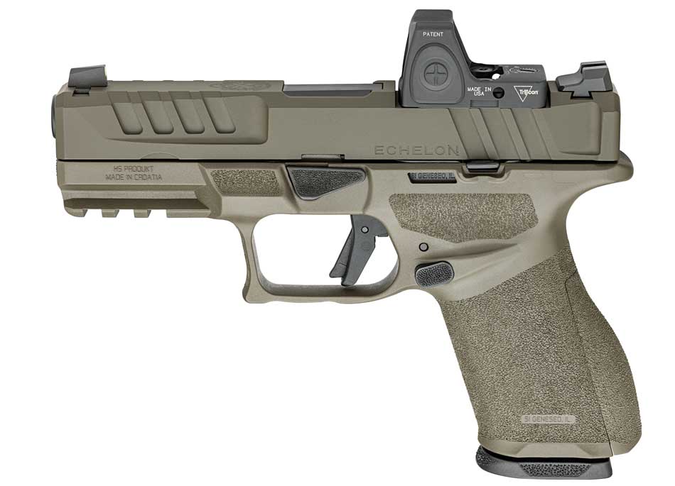 On the SHOT Show floor, I photographed the OD Green variant of the Springfield Armory Echelon 4.0C pistol. This model features a deep olive drab green frame paired with a black Melonite-coated slide. Its modular chassis system and optics-ready design were prominently displayed, highlighting the pistol’s adaptability for various shooters. The ergonomic grip texture and integrated accessory rail were also visible, underscoring its functionality. The booth lighting brought out the rugged elegance of this 9mm pistol, which offers a 15-round capacity. Positioned in front of Springfield’s branded materials, the OD Green Echelon drew a steady crowd. This photo captures the new finish option as part of Springfield's commitment to practical and aesthetic variety.